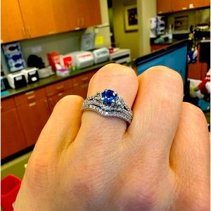 14kt white gold sapphire and diamond ring.  Prong set. Appraised for 4500.00